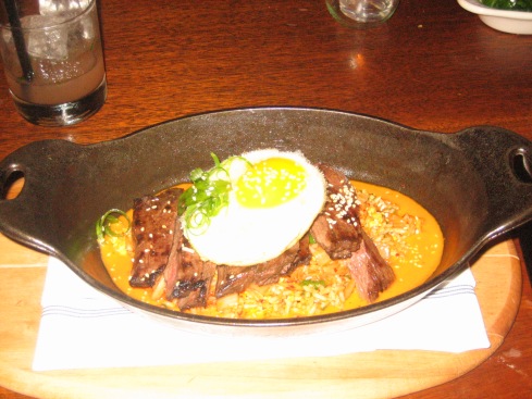 Skirt steak with kimchi fried rice and duck egg